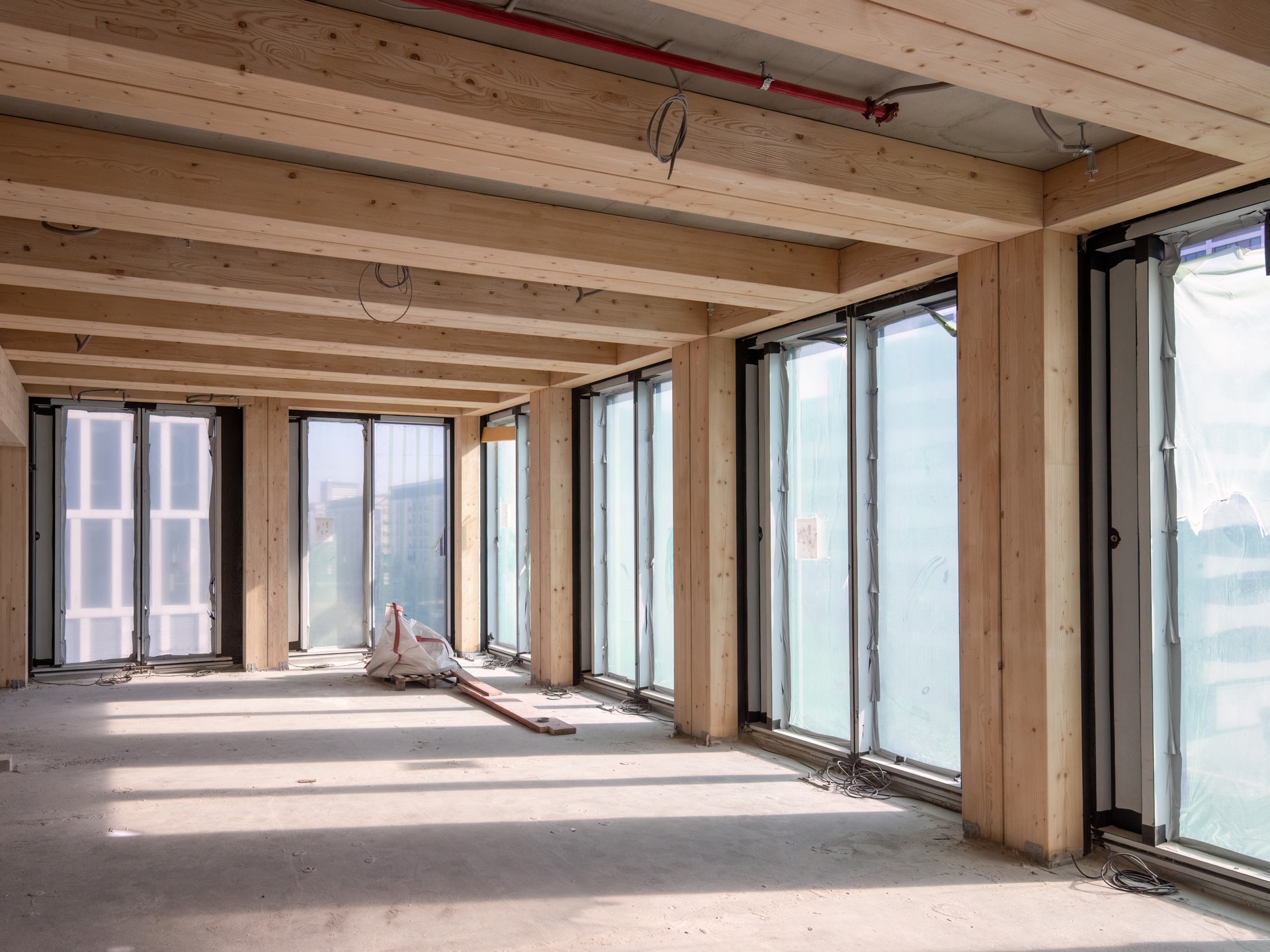 construction site of a sustainable Timber-concrete composite office building